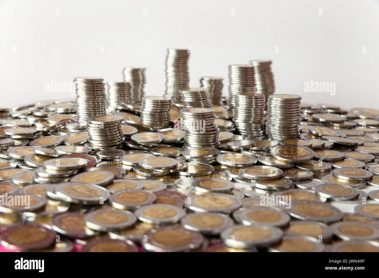 Un sacco di pesos messicani lo sfondo delle monete Foto Stock