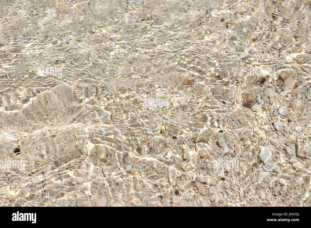 Increspature dell acqua di mare chiaro di Kaputian spiaggia di Isola Samal, Filippine Foto Stock
