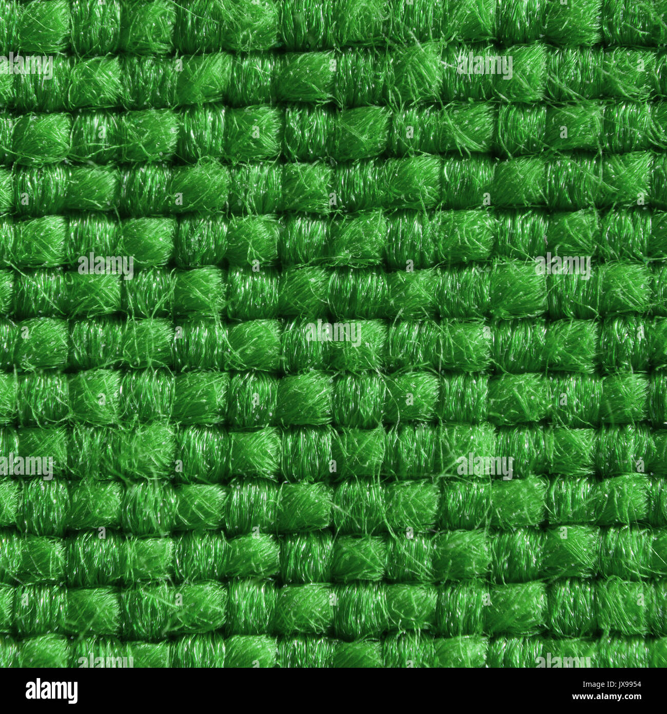 Tessuto verde con strutturato e fibre lavorate a maglia extreme close up. 1:3 Foto Stock