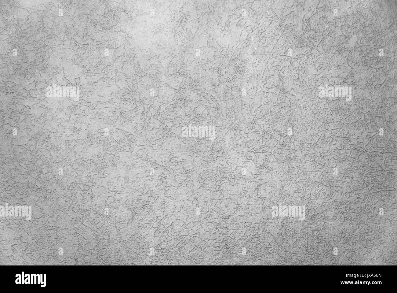 Textured calcestruzzo parete grigia con il crack per interni dello sfondo. Foto Stock