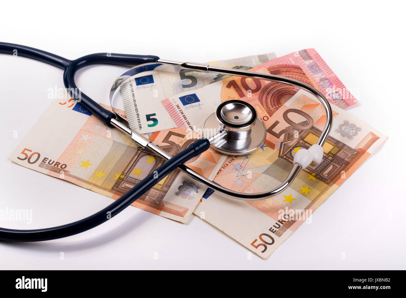 Uno stetoscopio in denaro di euro - healthcare cost concept Foto Stock