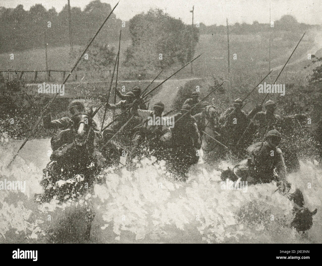 Il francese carica di cavalleria attraverso stream WW1 Foto Stock