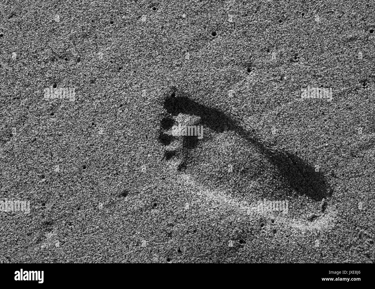A piedi nudi sulla sabbia Foto Stock