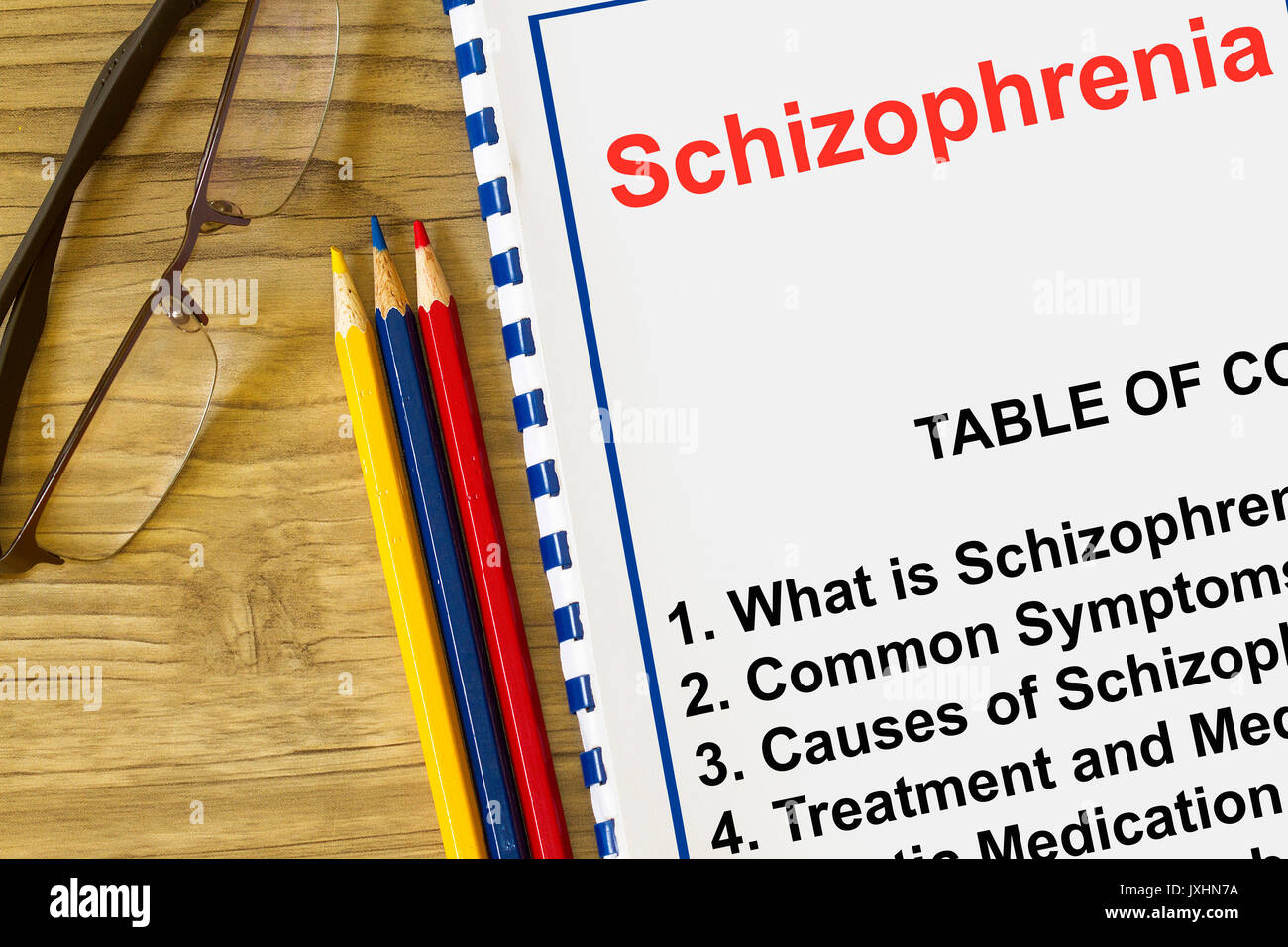 La schizofrenia del disordine mentale malattia con soggetto correlato su un coperchio di una conferenza Foto Stock