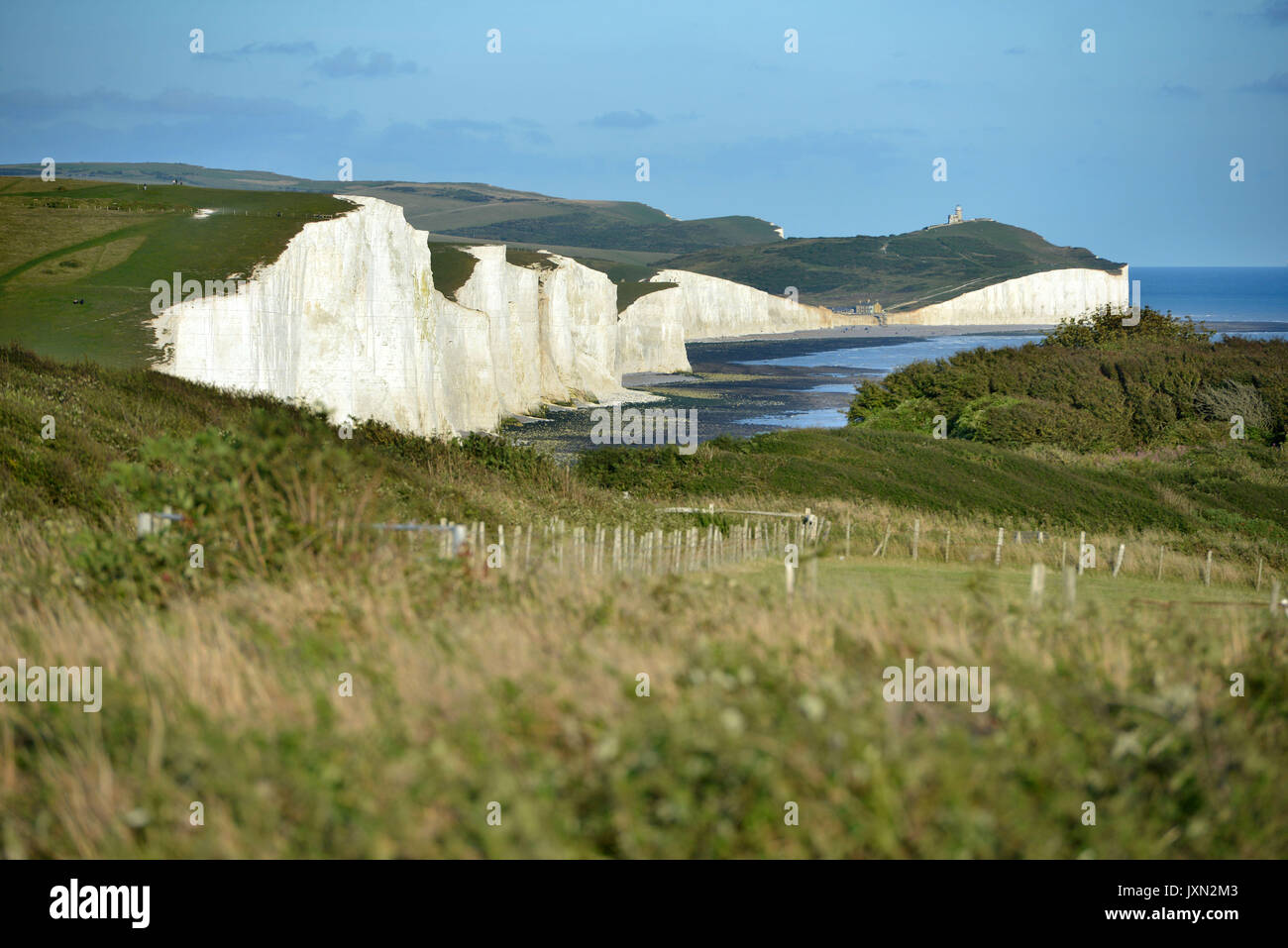 Tramonto all'iconico sette sorelle chalk cliffs, East Sussex, South Downs National Park Foto Stock