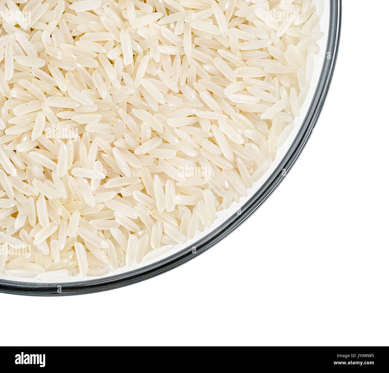 Cibo sano. Vaso di vetro con riso parboiled su sfondo bianco. Close up, vista dall'alto, alta risoluzione prodotto. Foto Stock