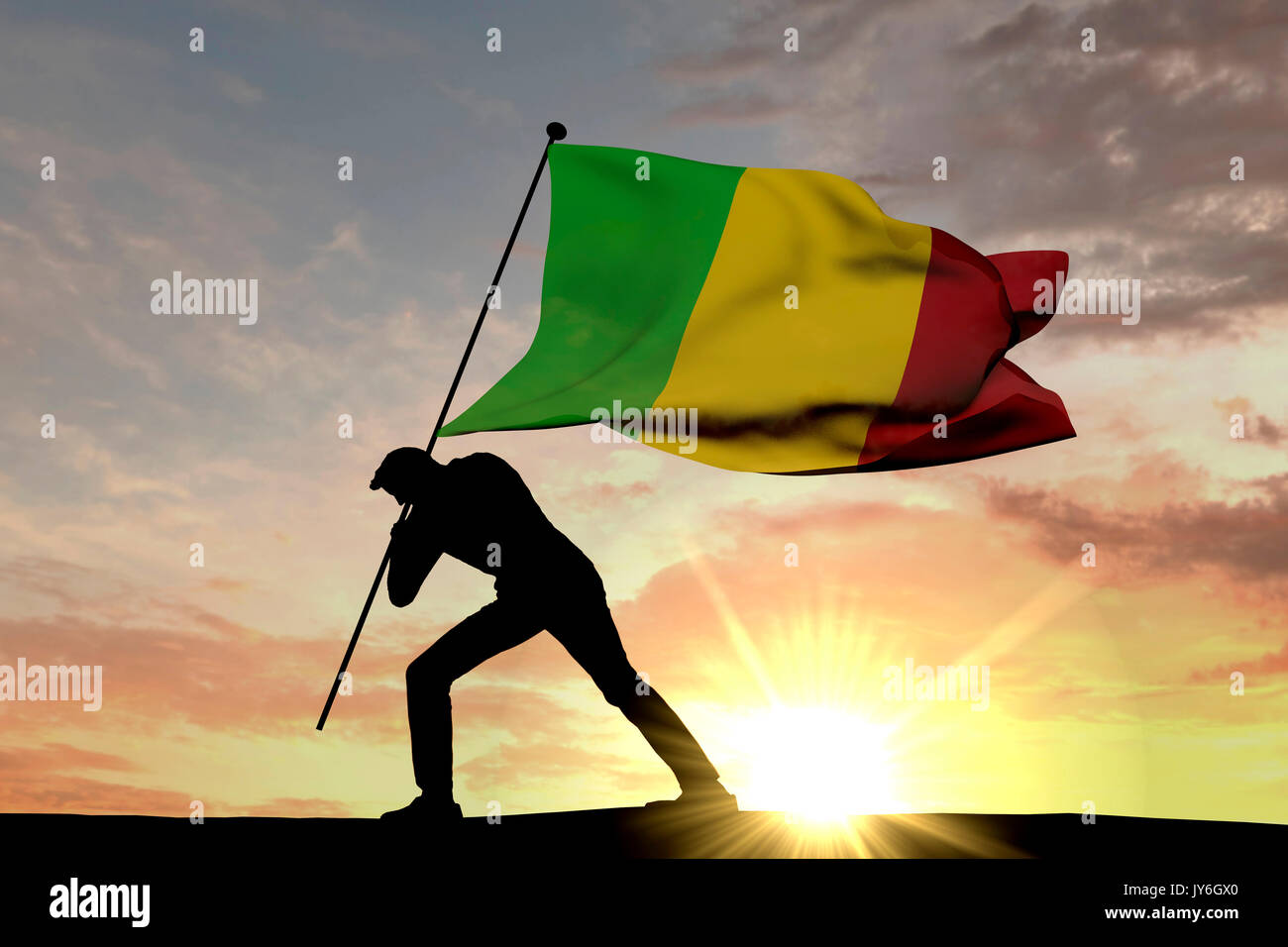 Mali bandiera di essere spinta nel terreno da un maschio di silhouette. Il rendering 3D Foto Stock