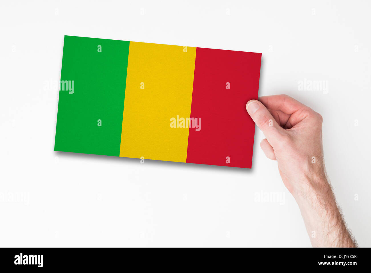 Maschio di mano azienda mali bandiera Foto Stock