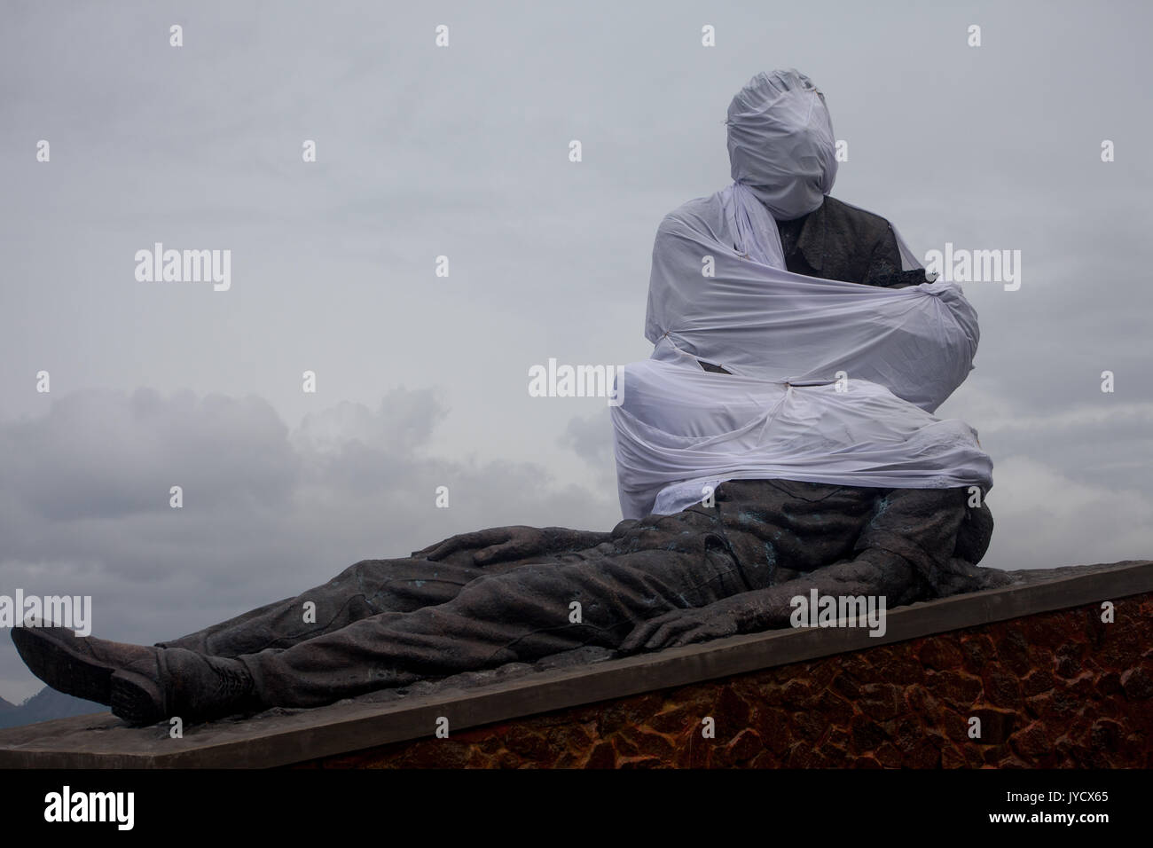 Timor est. una statua a Dili, commemorazione di quelli uccisi nel massacro di santa cruz in 1991 Foto Stock