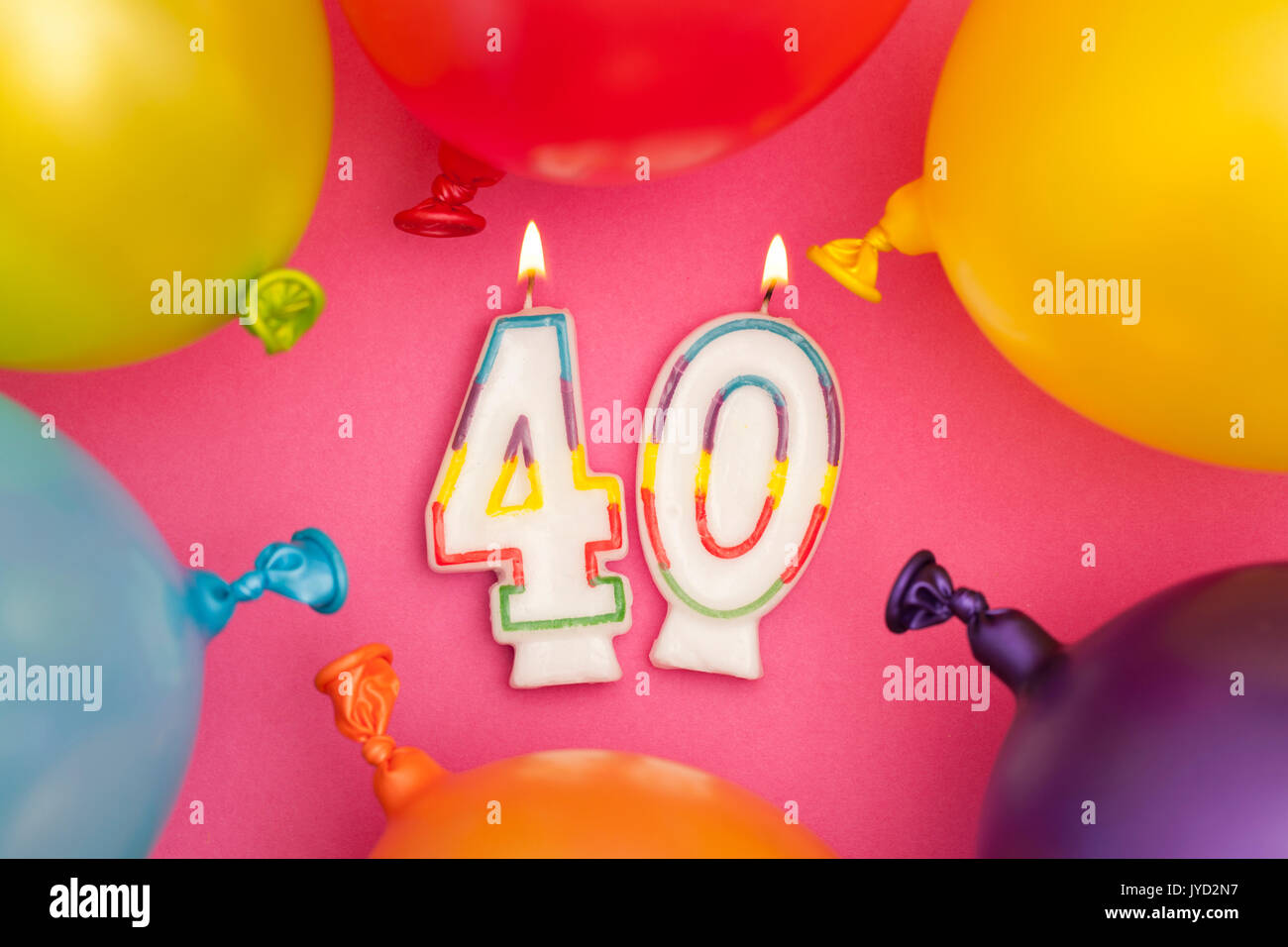 Buon compleanno numero 40 celebrazione candela con palloncini colorati Foto Stock
