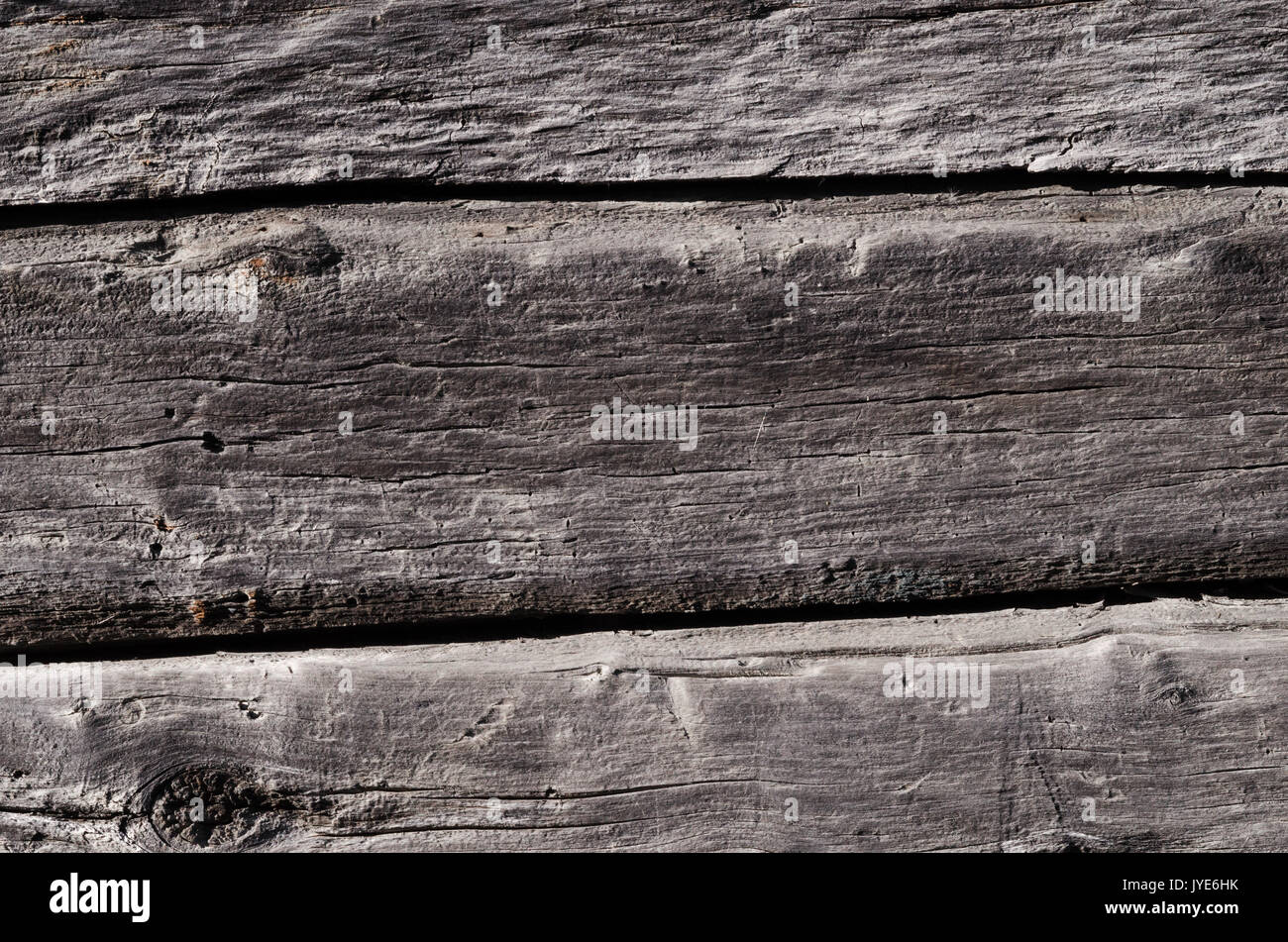 La texture, vecchie schede grigio con crepe. La foto in orizzontale, sfondo Foto Stock