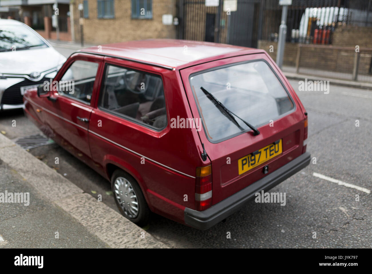 Il Reliant Robin parcheggiato sulla strada di Leyton, a est di Londra. Foto Stock