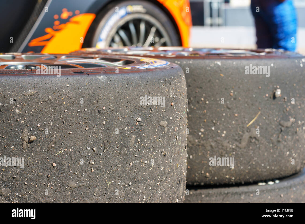 Pila di utilizzato pneumatici da competizione in lega leggera, disco dopo racing Foto Stock