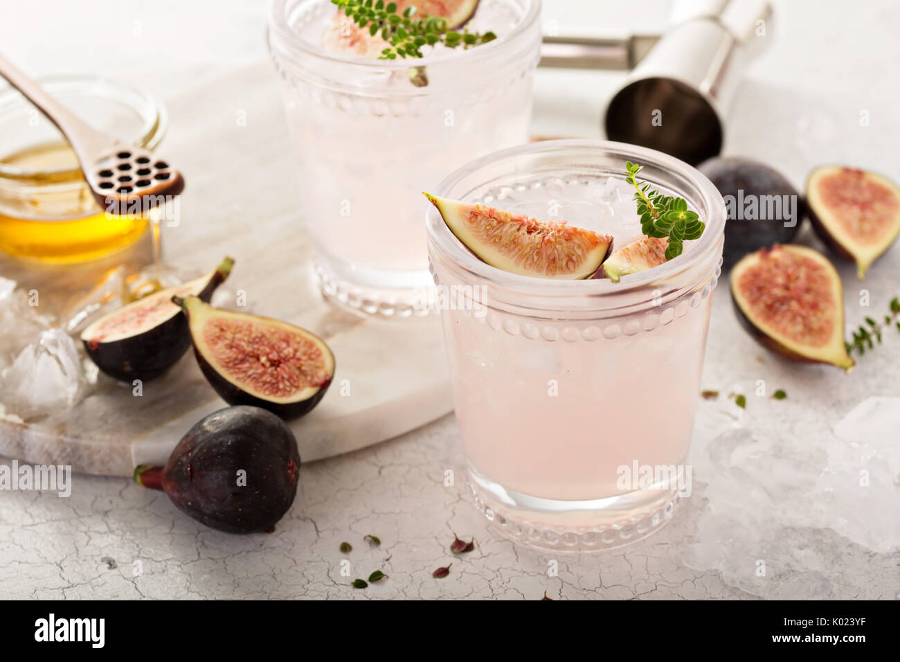 Rosa fig cocktail con miele e timo Foto Stock