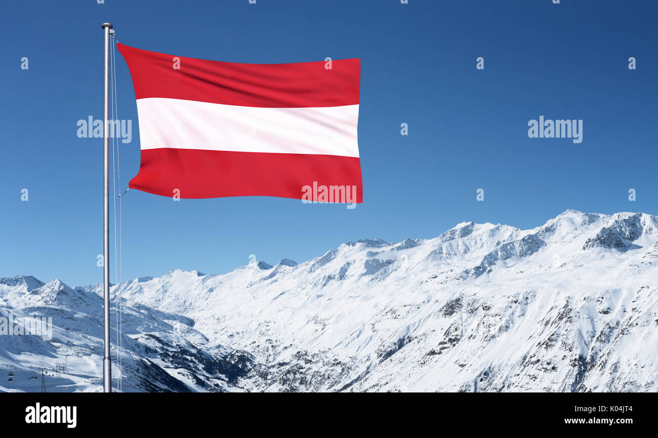 La bandiera austriaca in volo da un palo metallico nella parte anteriore del Oztal Alpi di Obergurgl, Austria Foto Stock