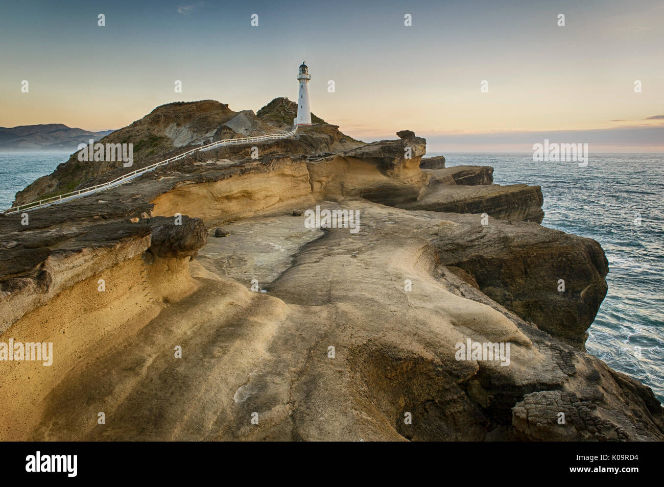 Sunrise al Castlepoint faro, Wairarapa, Nuova Zelanda. Foto Stock