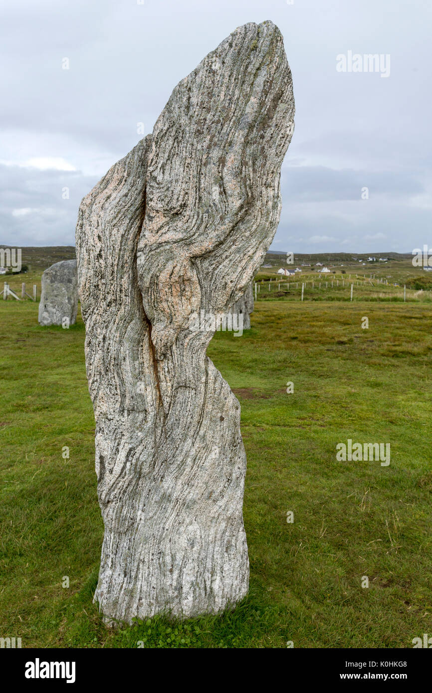 Pietra stratificata, Callanish Standing pietre pietre permanente posto in una configurazione a croce con al centro un cerchio di pietra, Callanish, Scotland, Regno Unito Foto Stock