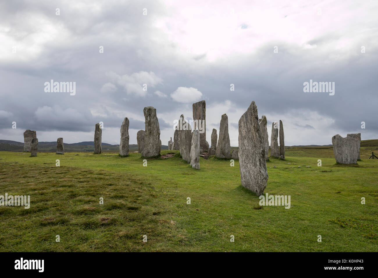 Callanish pietre in piedi in un giorno nuvoloso, , pietre permanente posto in una configurazione a croce con al centro un cerchio di pietra, Callanish, Scotland, Regno Unito Foto Stock