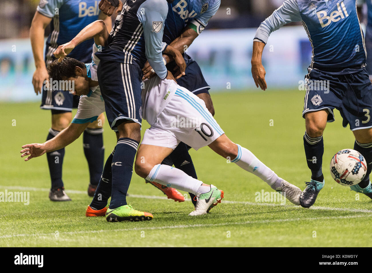 Vancouver, Canada. 23 Ago, 2017. Nicolas Lodeiro (10) di Seattle sirene, perdendo il suo piede. Il gioco termina in una cravatta 1-1, con obiettivi da Nicolas Lodeiro (10) di Seattle, sirene e Fredy Montero (12) di Vancouver Whitecaps Vancouver Whitecaps vs Seattle sirene, BC Place Stadium. Credito: Gerry Rousseau/Alamy Live News Foto Stock