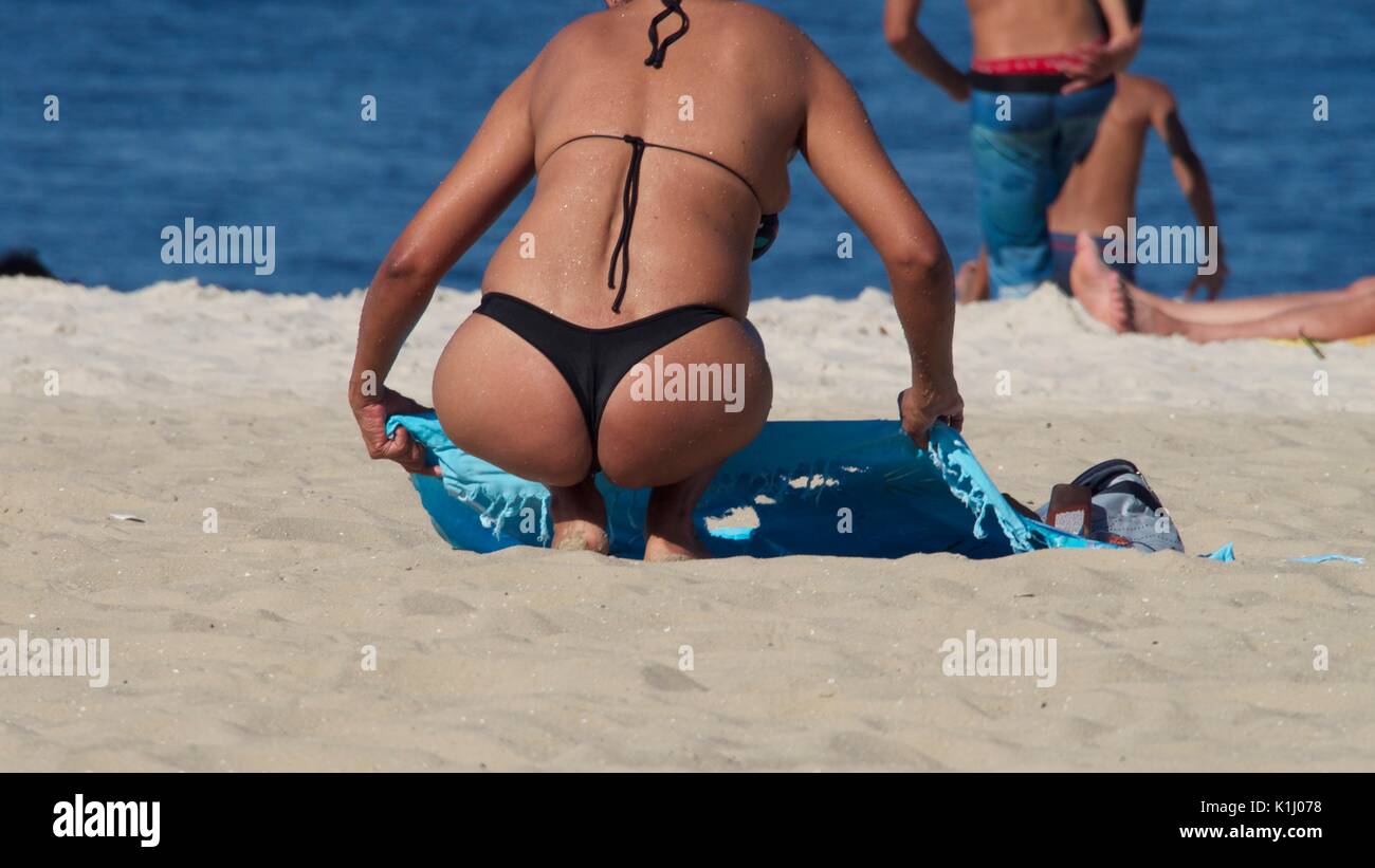 donna sulla spiaggia Foto Stock