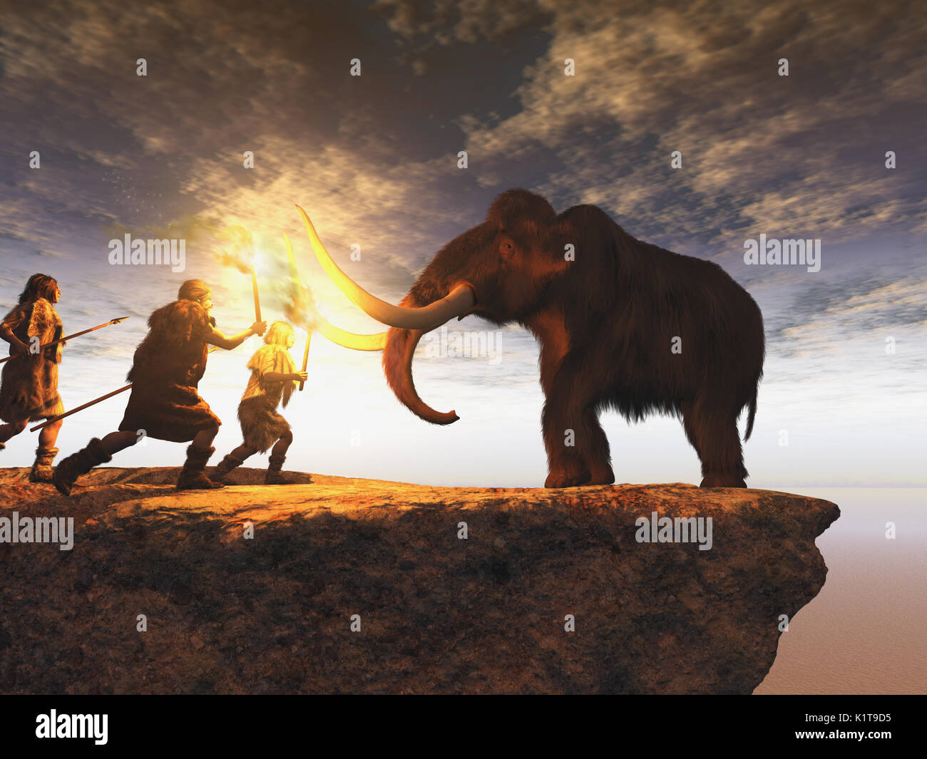 Gli uomini preistorici di caccia un giovane mammut Foto Stock