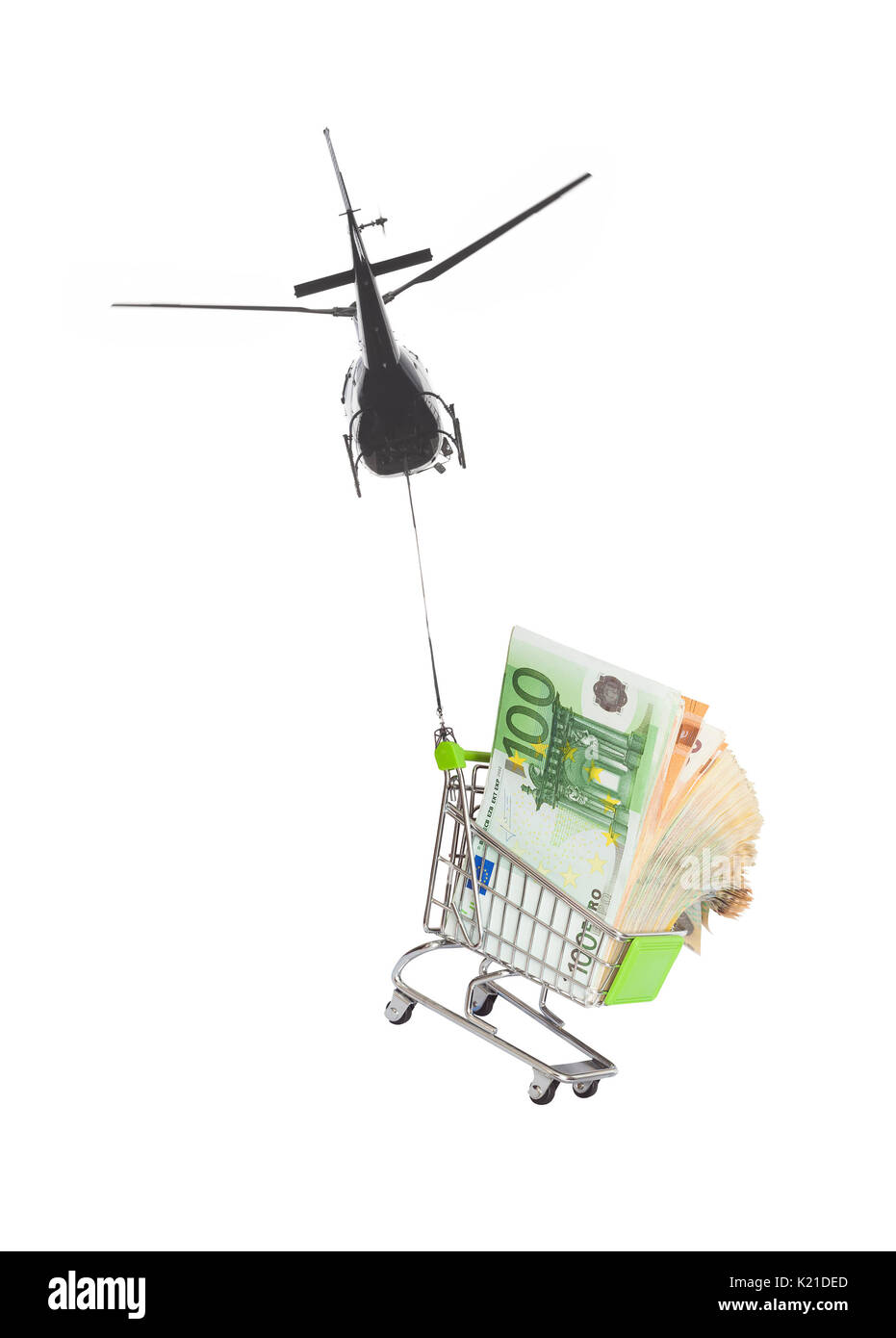 Un elicottero che vola con denaro la concezione di business di successo Foto Stock