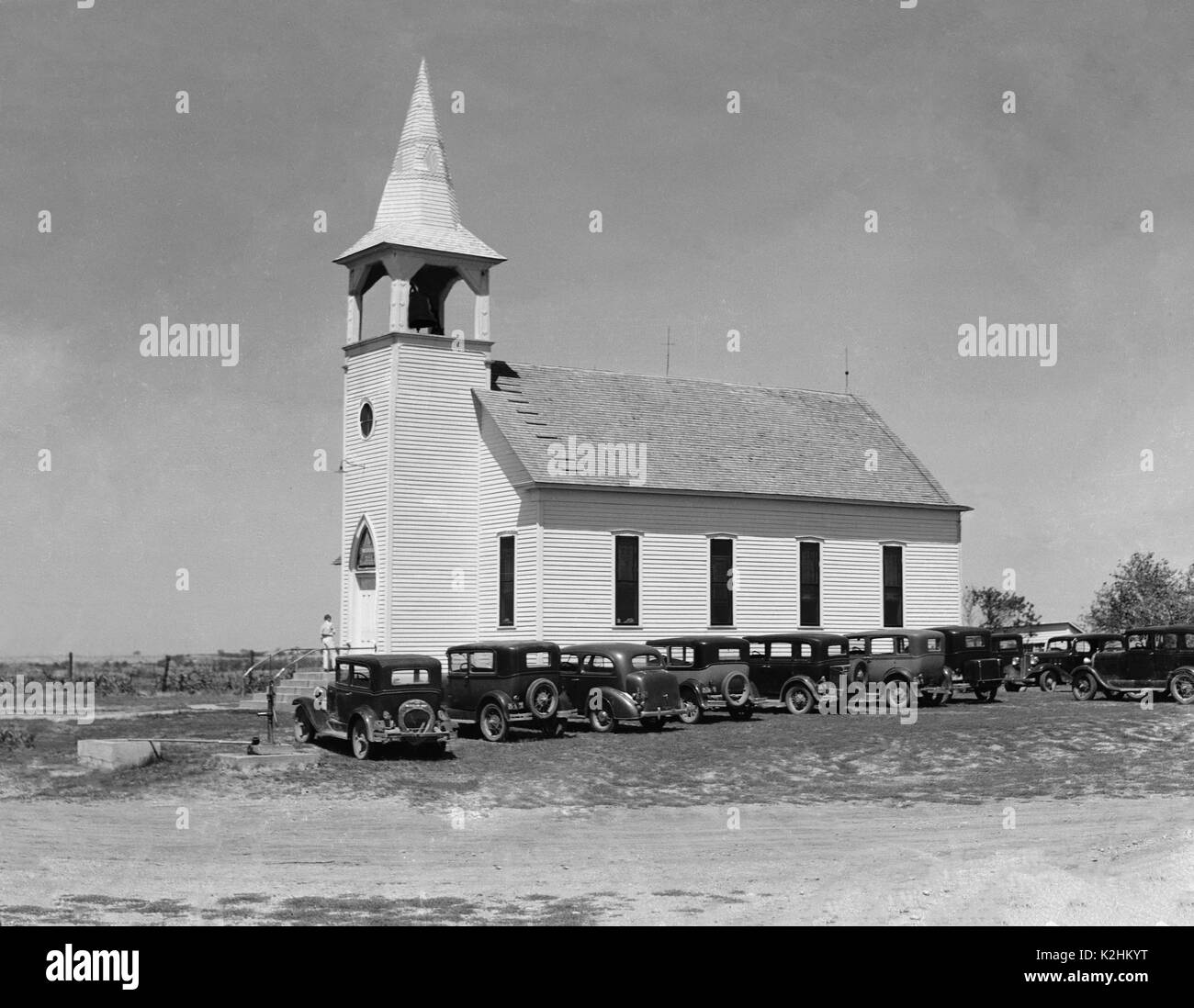 La Chiesa con le auto parcheggiate nella parte anteriore Foto Stock