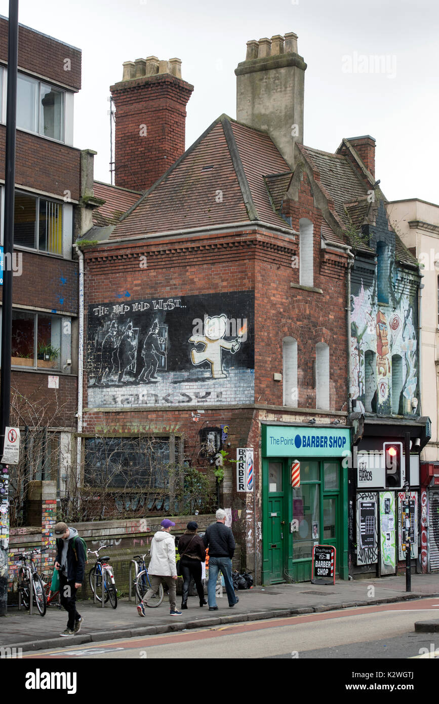 Banksy è "mild Mild West' illustrazione a Stokes Croft, Bristol REGNO UNITO Foto Stock