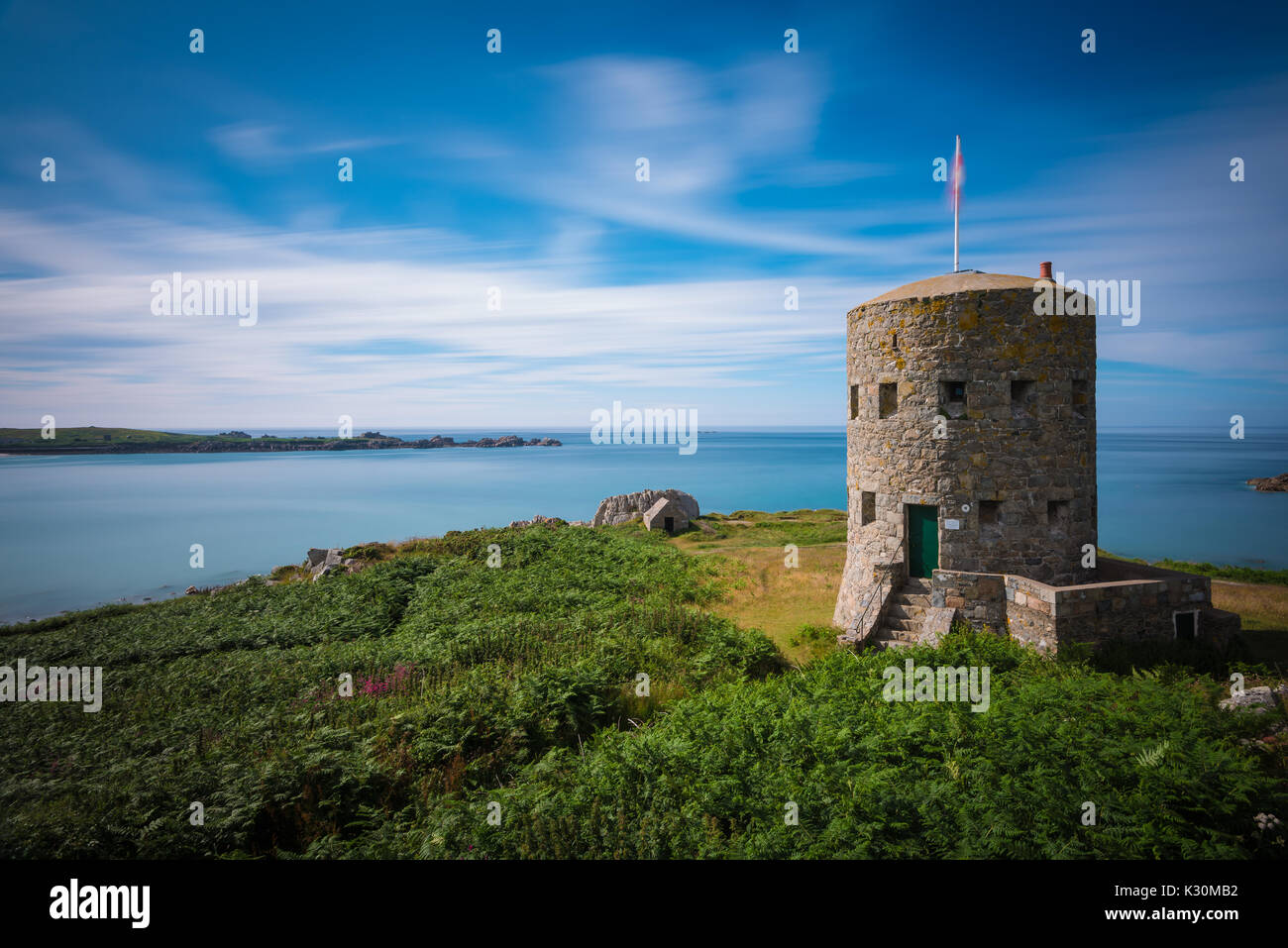 L'ancresse torre in Guernsey, Isole del Canale, Regno Unito Foto Stock