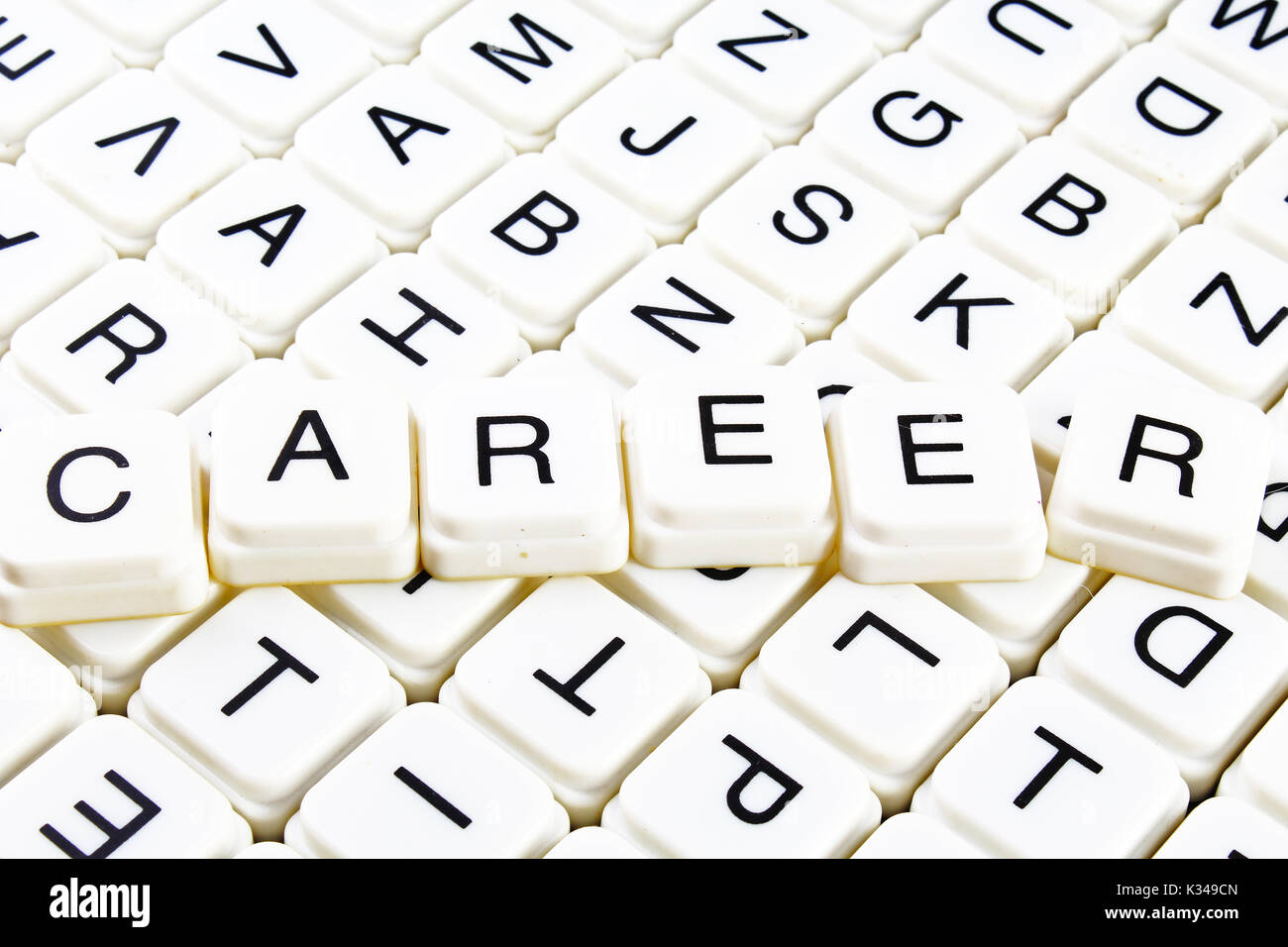 Carriera di testo parola cruciverba. Lettere dell'alfabeto blocchi texture di gioco dello sfondo. Foto Stock