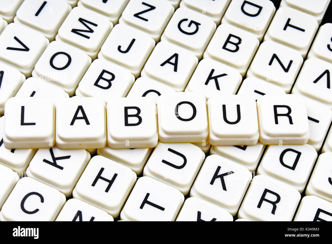 Il lavoro di testo parola cruciverba. Lettere dell'alfabeto blocchi texture di gioco dello sfondo. Foto Stock