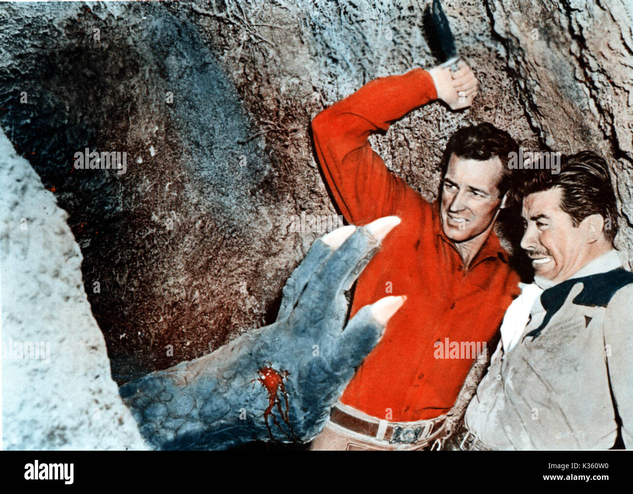 La Bestia di montagna cava GUY MADISON con coltello, auto;OS RIVAS data: 1956 Foto Stock