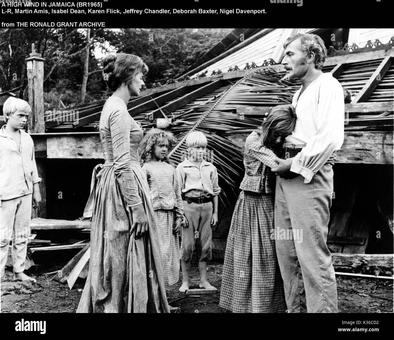Un vento forte IN GIAMAICA L-R, Martin Amis, ISABEL DEAN, KAREN FLICK, Jeffrey Chandler, Deborah Baxter, Nigel DAVENPORT Foto Stock