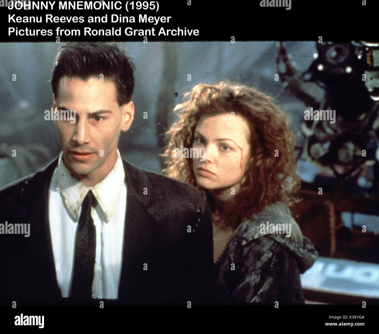 JOHNNY MNEMONICA Keanu Reeves, DINA MEYER data: 1995 Foto Stock