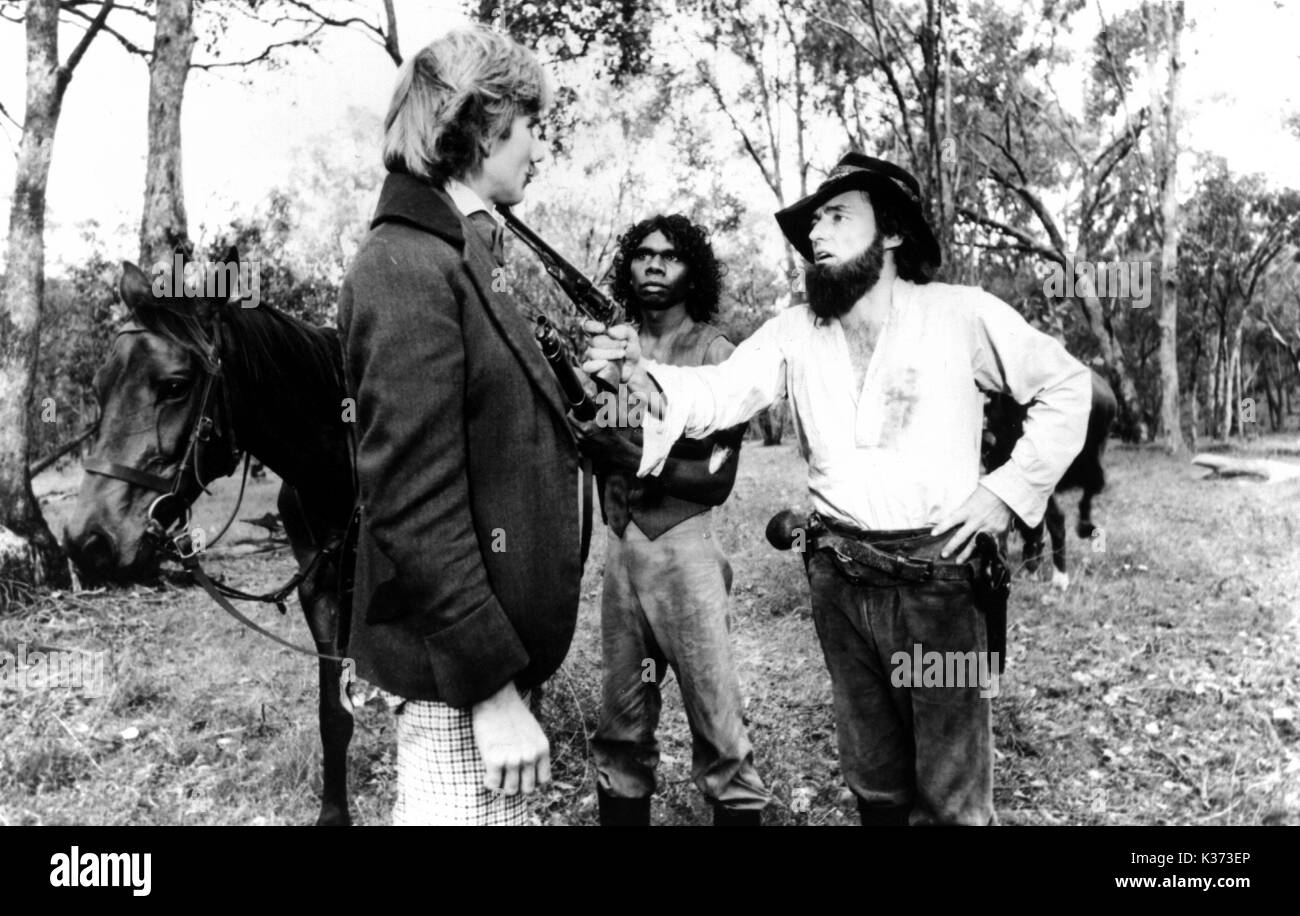 MAD DOG MORGAN aka MAD DOG-L-R, JOHN HARGREAVES, DAVID GULPILIL, Dennis Hopper Foto Stock