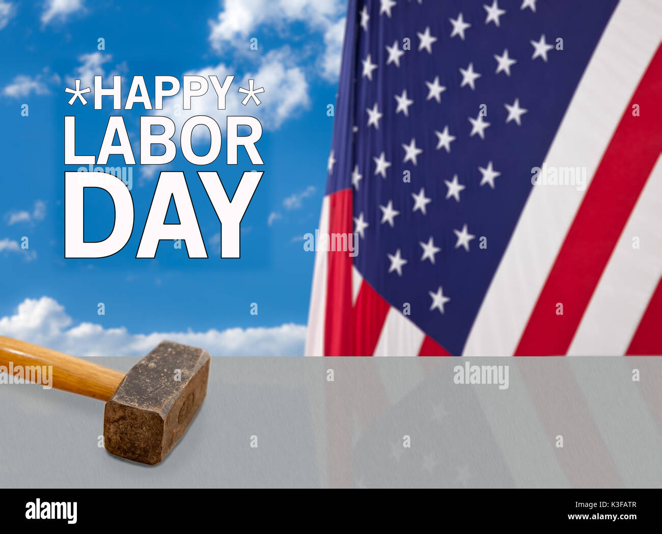 Felice Giornata del Lavoro lo sfondo con un martello Foto Stock