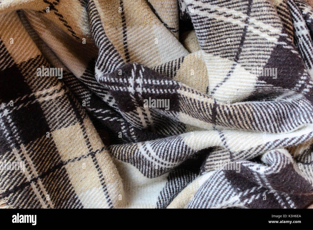 A scacchi in morbido e caldo plaid beige foto Foto Stock