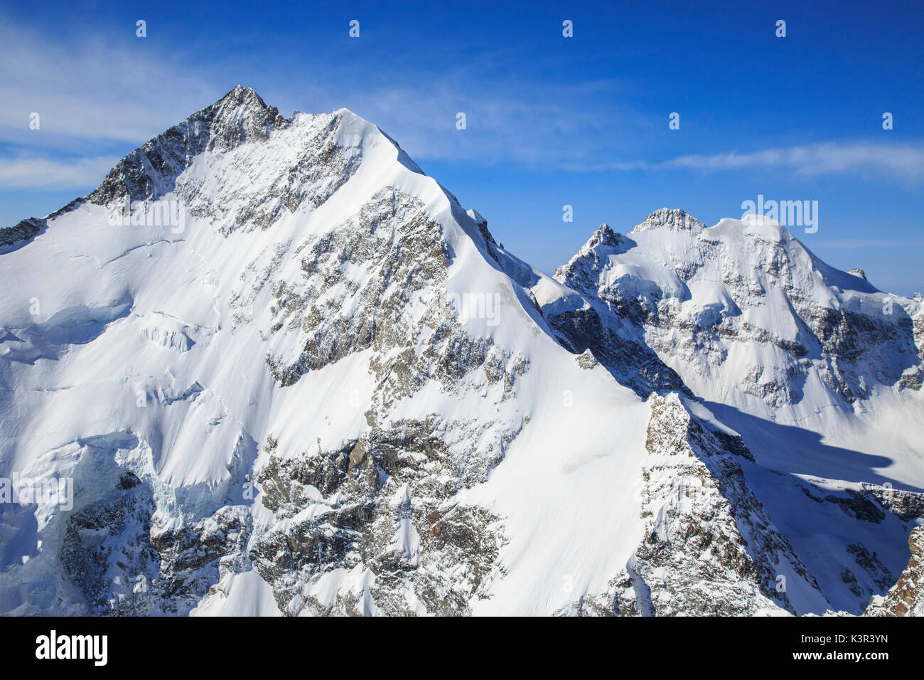 Vista aerea del Pizzo Bernina e del Piz Roseg. In Engadina, nel Cantone dei Grigioni, in Svizzera Europa Foto Stock