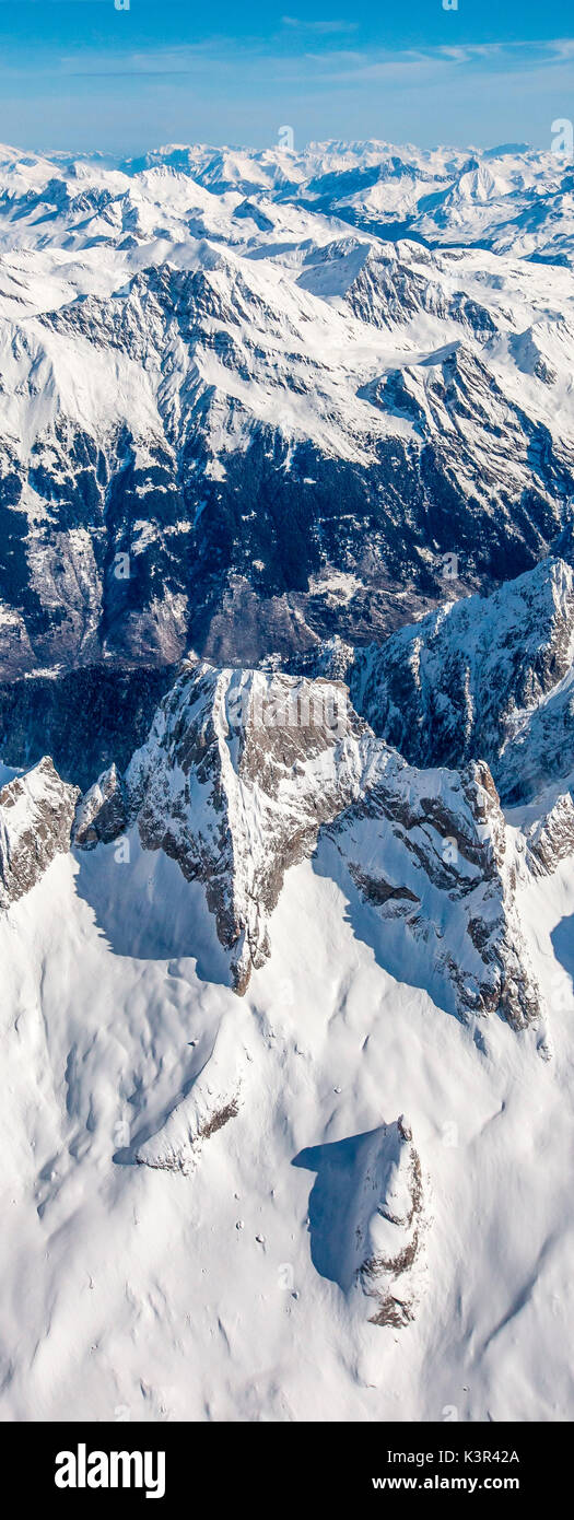 Vista aerea del lato italiano del Pizzo Badile in inverno, Valmasino. Valtellina Lombardia Italia Europa Foto Stock