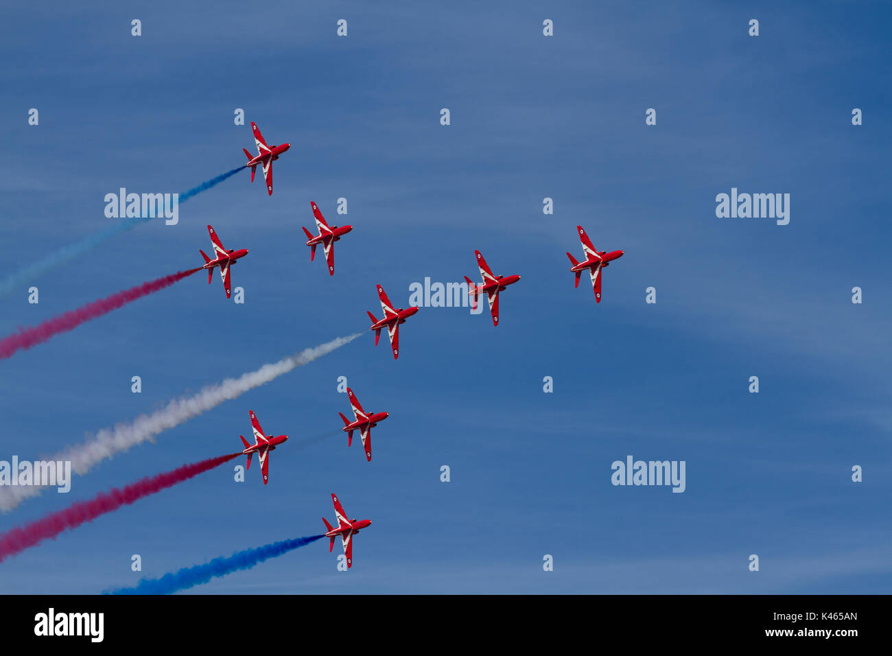 RAF frecce rosse di eseguire il loro volo visualizzazione all'Airshow di Southport in Inghilterra, Regno Unito Foto Stock