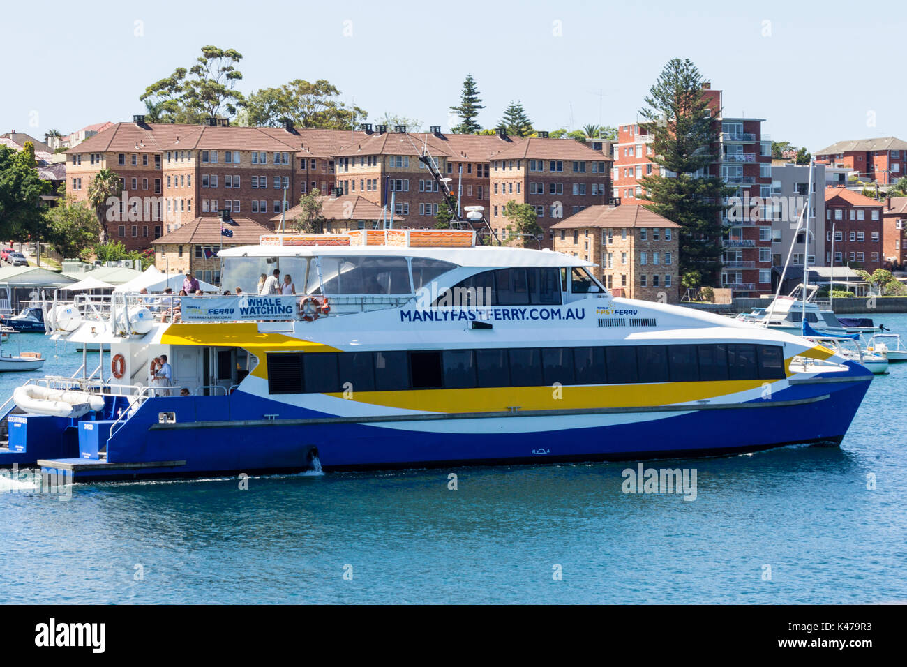 Il Manly il traghetto veloce lasciando Manly per Circular Quay, Sydney, NSW,New South Wales, Australiacatamaram Foto Stock