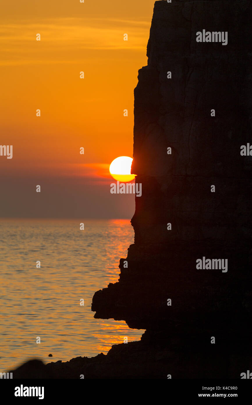 Tramonto dietro un stagliano cliff, pulpito Rosck Foto Stock