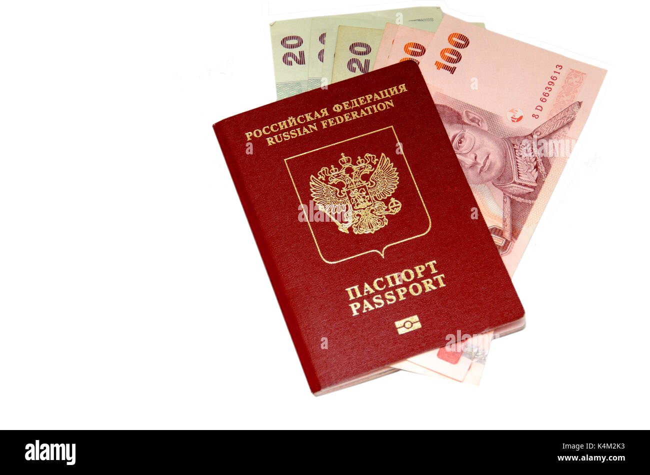 Baht tailandese e il passaporto isolato Foto Stock