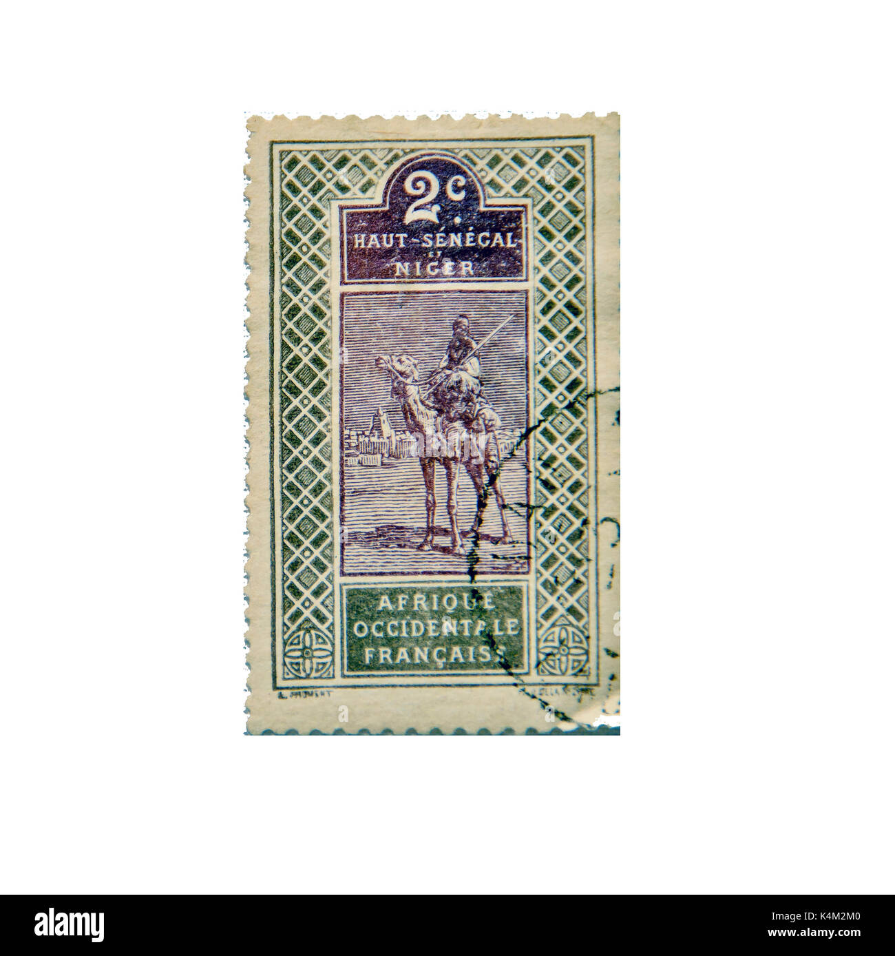 NIGER - CA. 1915: francobollo ca. 1915 dal Niger e Senegal superiore che mostra una scena tradizionale di un uomo su un cammello Foto Stock