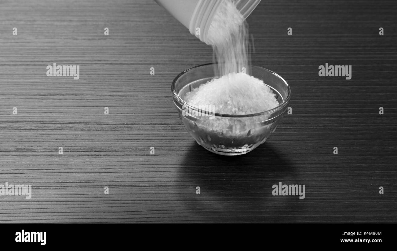 lo zucchero in una ciotola Foto Stock