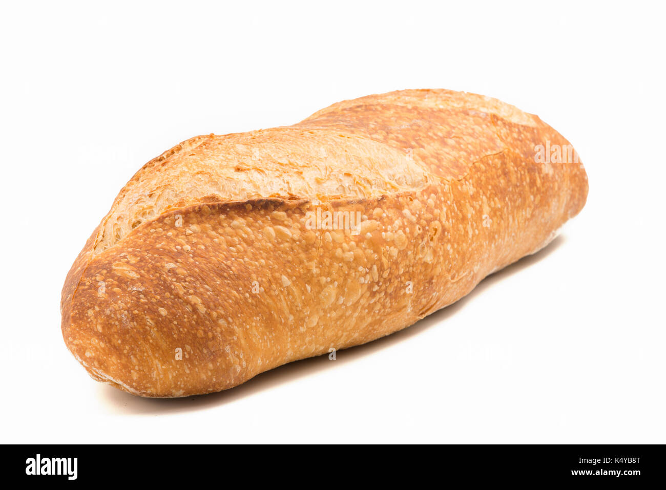 Rustico pane di grano isolato su sfondo bianco Foto Stock