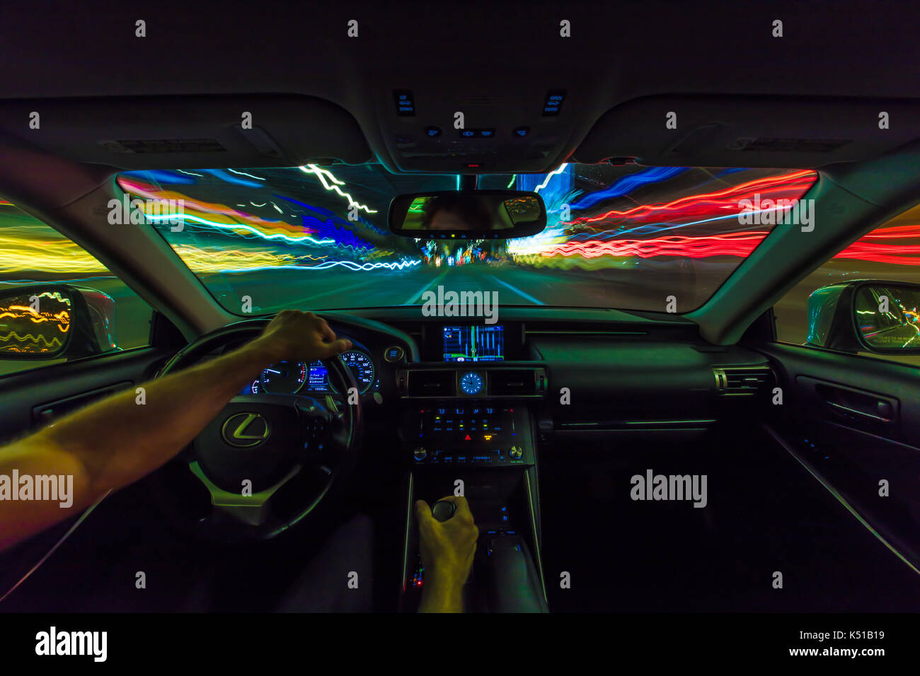 La guida veloce di notte Foto Stock