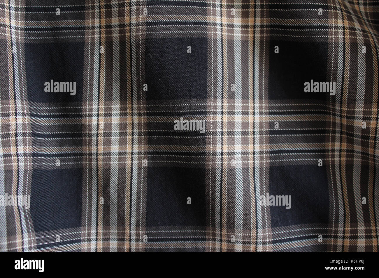 Colore blu-grigio-marrone-sfondo della controllata tartan scozzese. Foto Stock