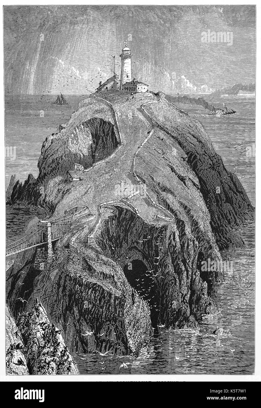 1870: il Sud pila faro fu costruito sulla sommità di una piccola isola a nord-ovest della costa di Isola Santa, Anglesey, Galles. Fu costruita nel 1809 per avvertire le navi delle rocce pericolose di seguito. Foto Stock