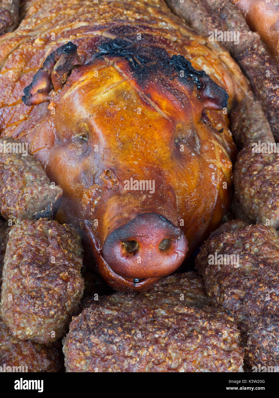 Maiale morto essendo cotti sul barbecue di Norfolk Foto Stock